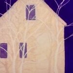 Pale pink house surrounded by blue